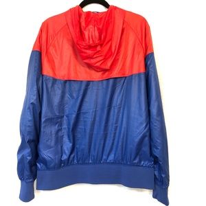 red white and blue nike jogging suit